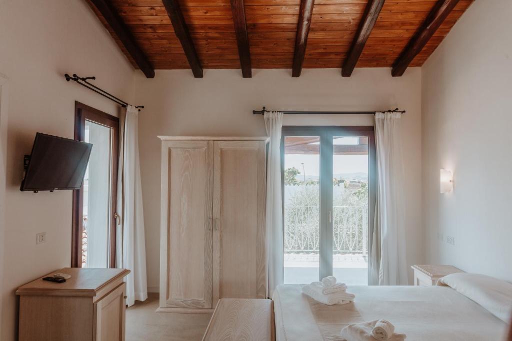 Badkamer met ligbad — Fior di Sardegna Resort