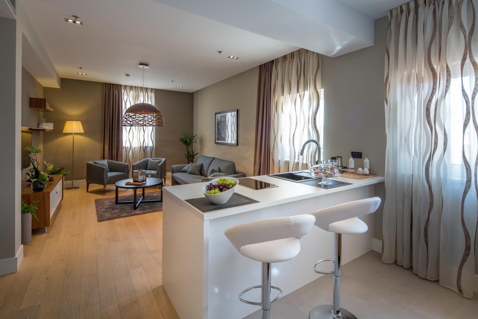 Suite met zithoek — Cornaro Hotel