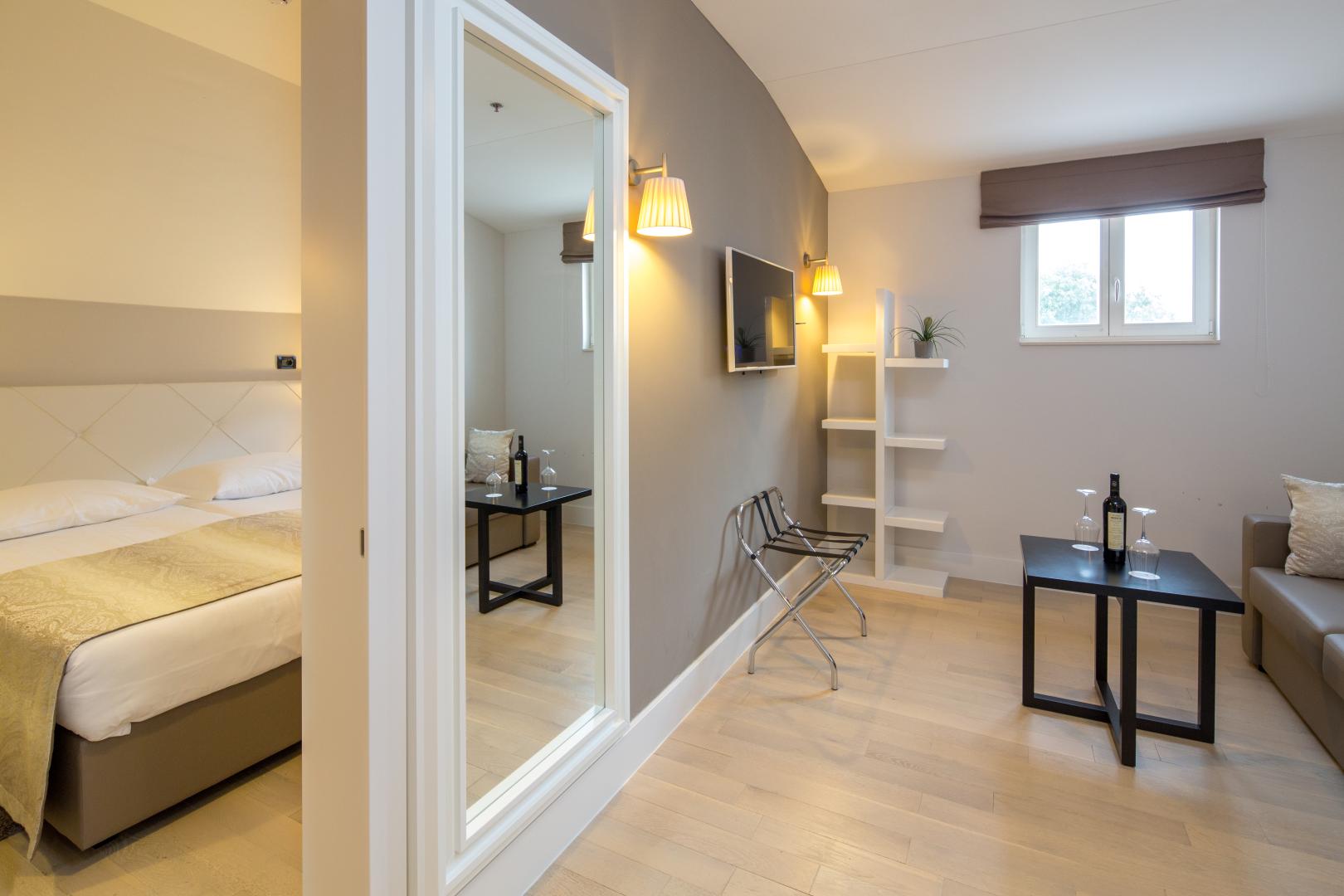 Suite met zithoek — Cornaro Hotel