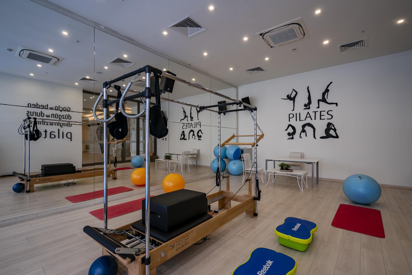 Fitnessruimte met cardio-apparaten — Mivara Luxury Resort & Spa
