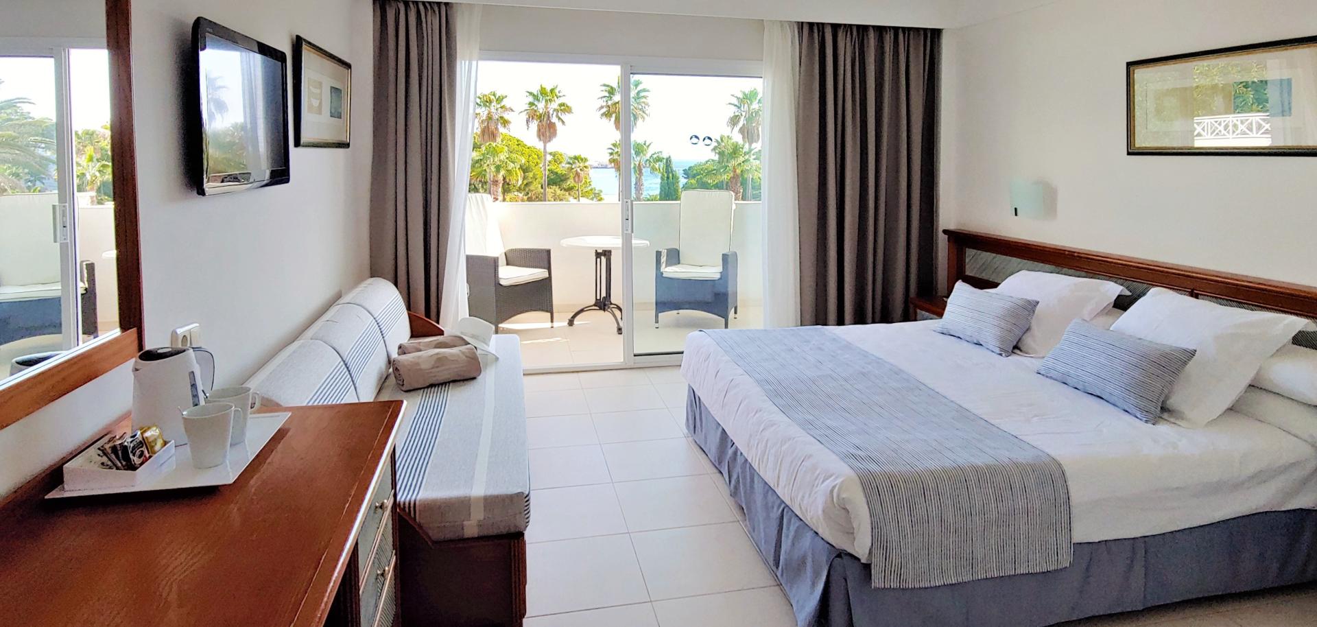 Suite met zithoek — Hotel Rocamarina