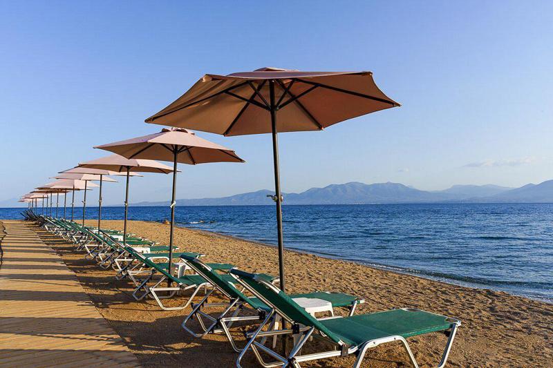 Calamos Beach Hotel in Agioi Apostoli - foto 5