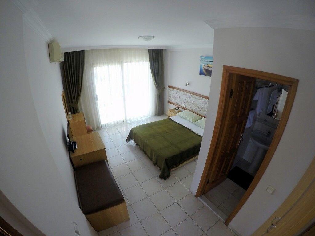 Suite met zithoek — Gün-Ay Otel