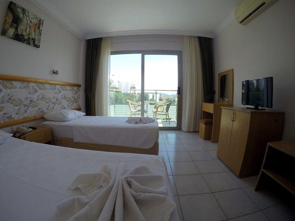 Suite met zithoek — Gün-Ay Otel