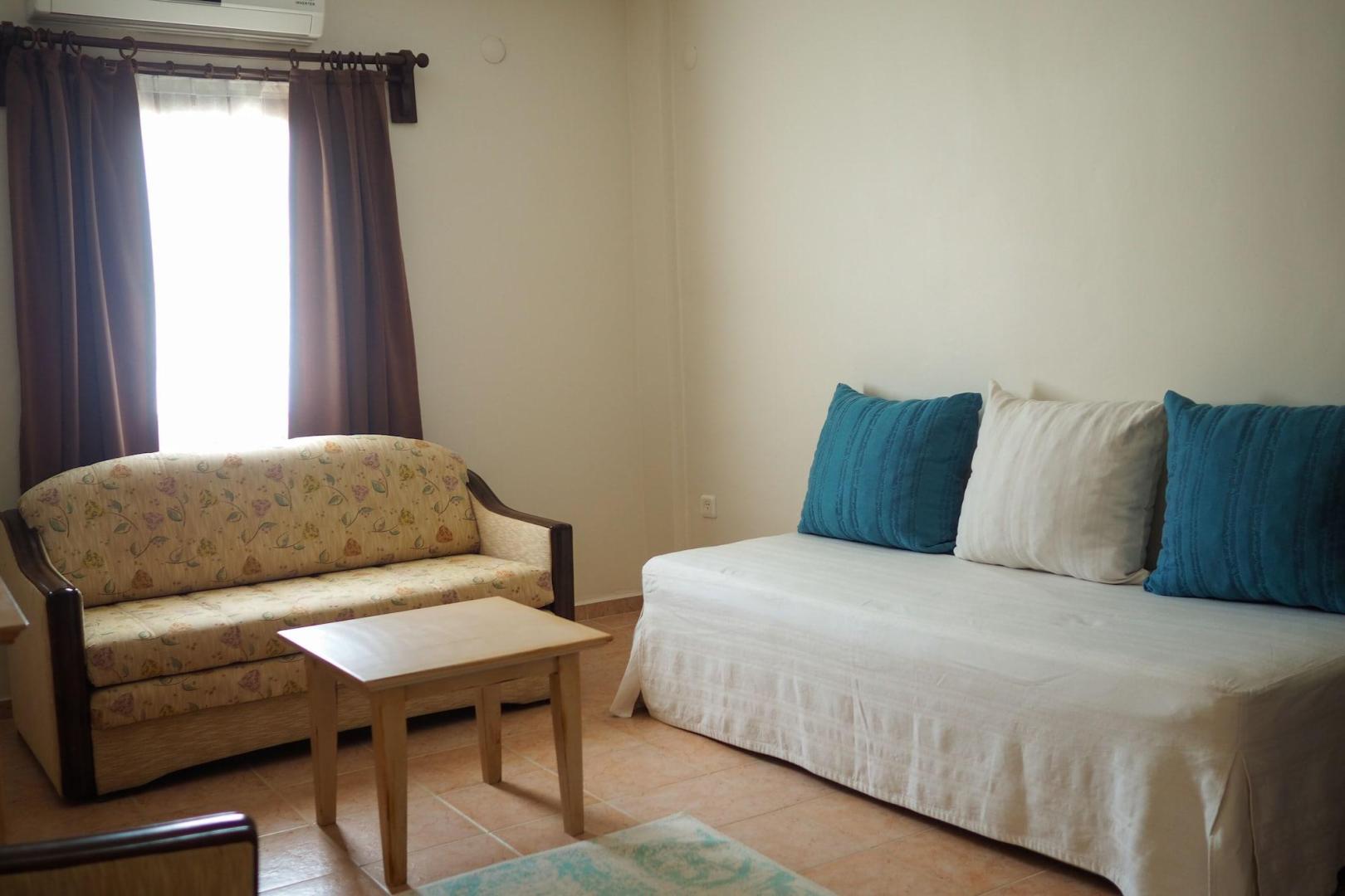 Suite met zithoek — Oya Boutique Hotel & Suites