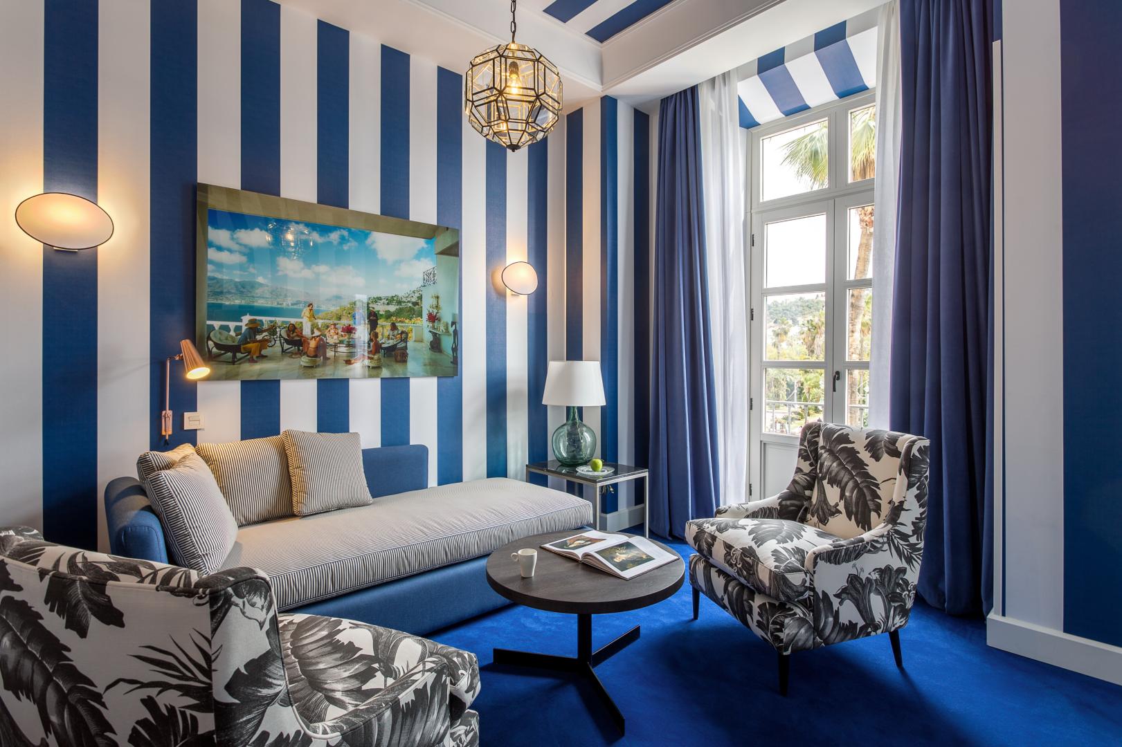 Suite met zithoek — Room Mate Valeria