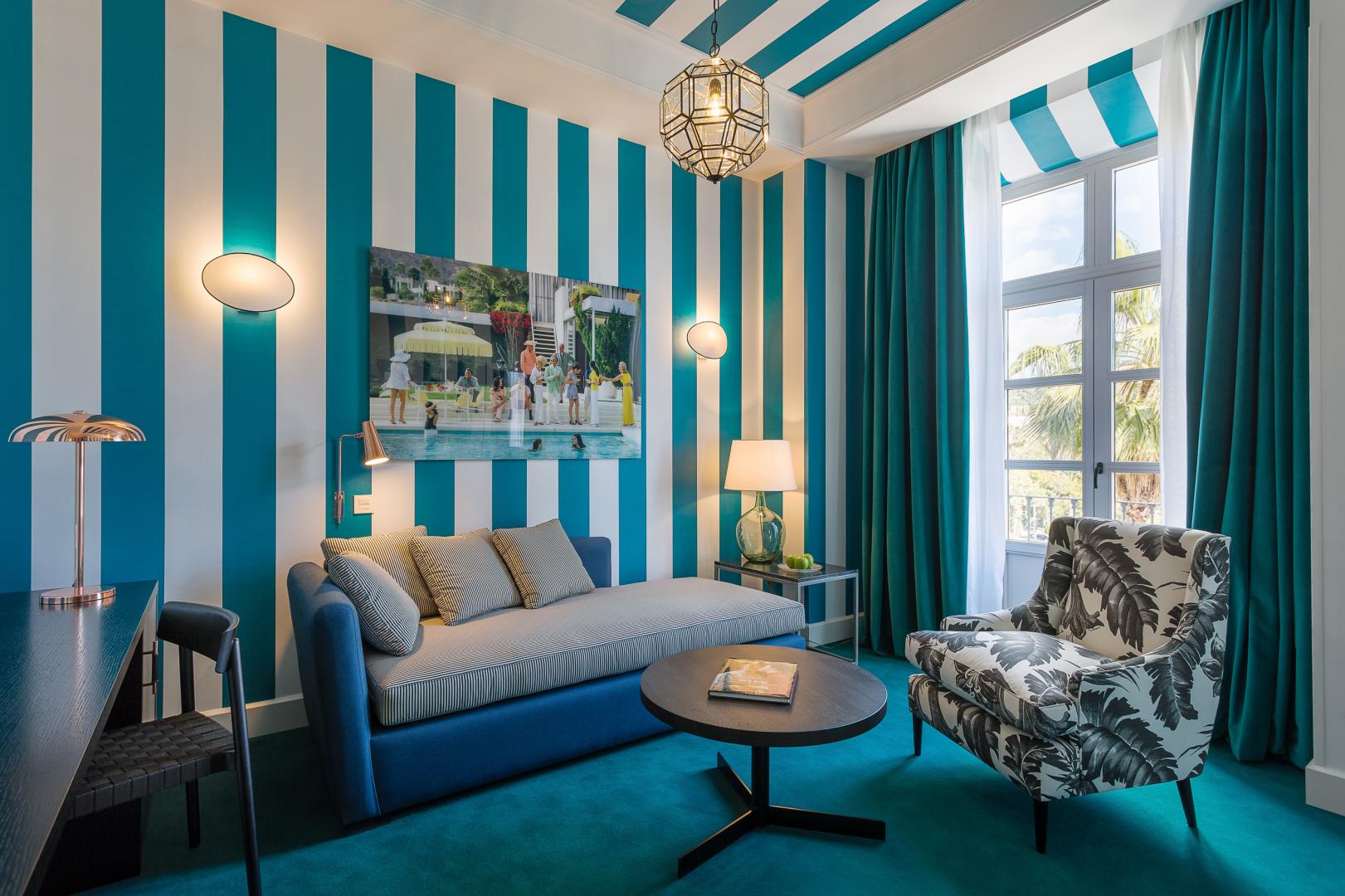 Suite met zithoek — Room Mate Valeria