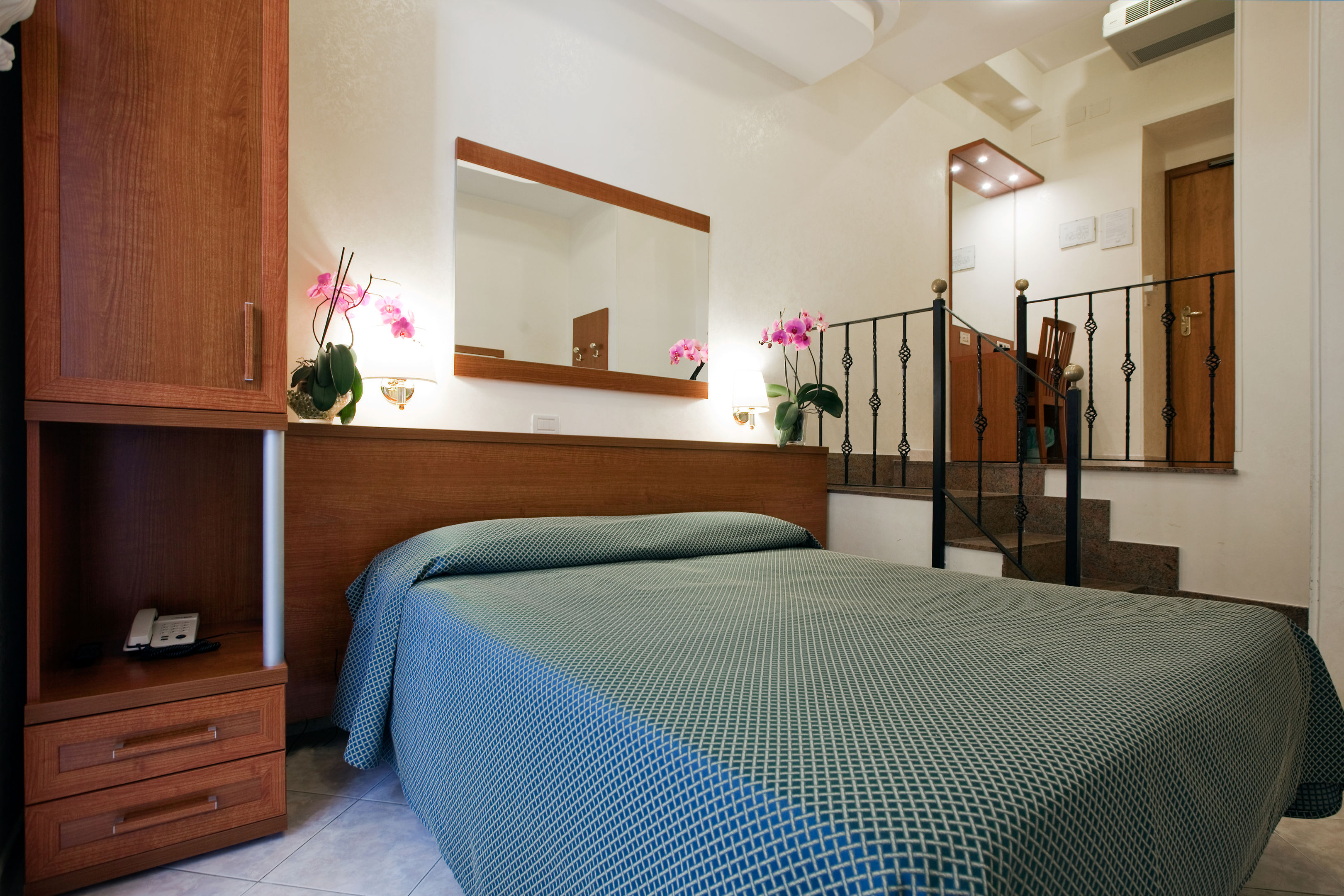 Kamer met twee aparte bedden — Delle Muse