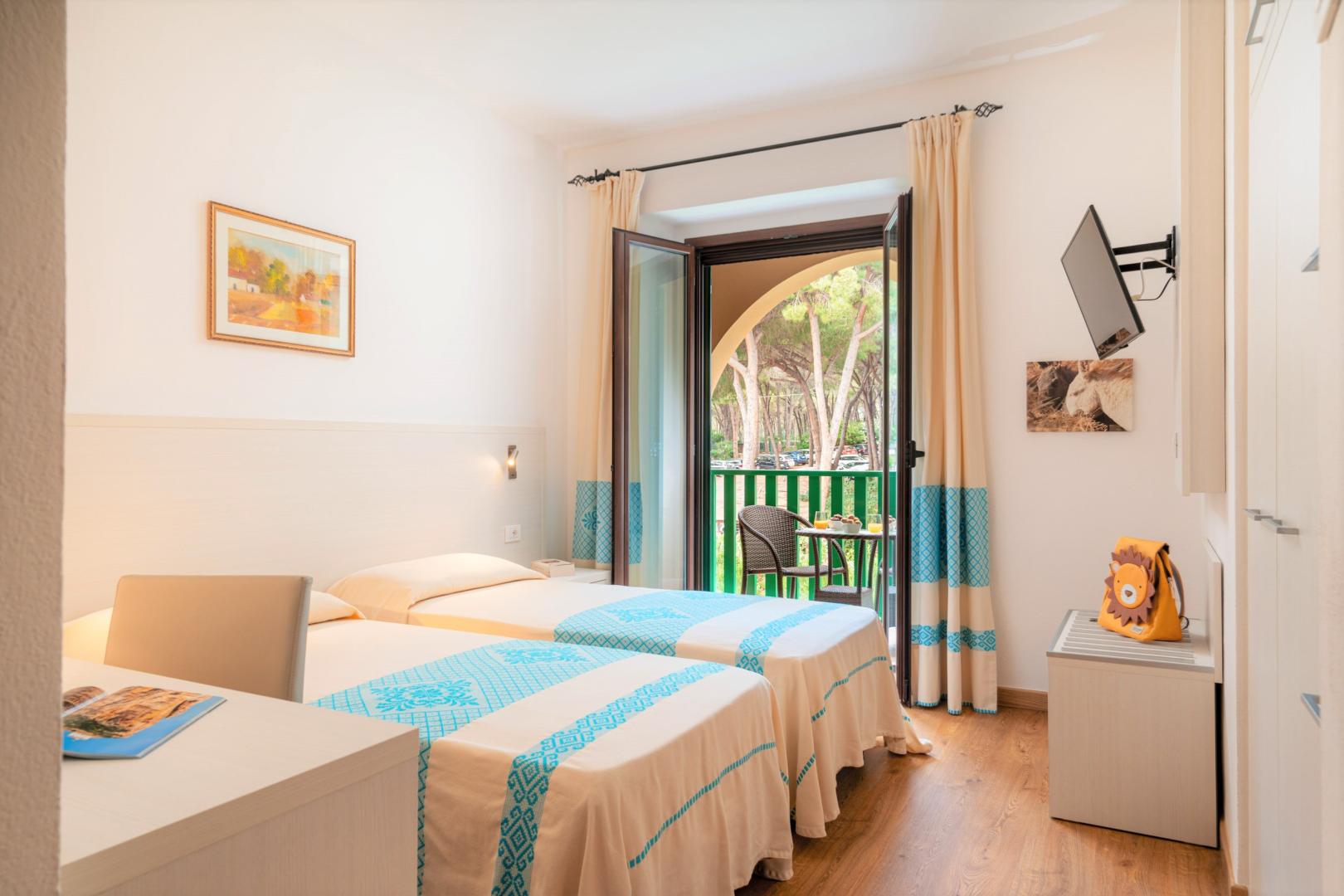 Suite met zithoek — Hotel Dei Pini