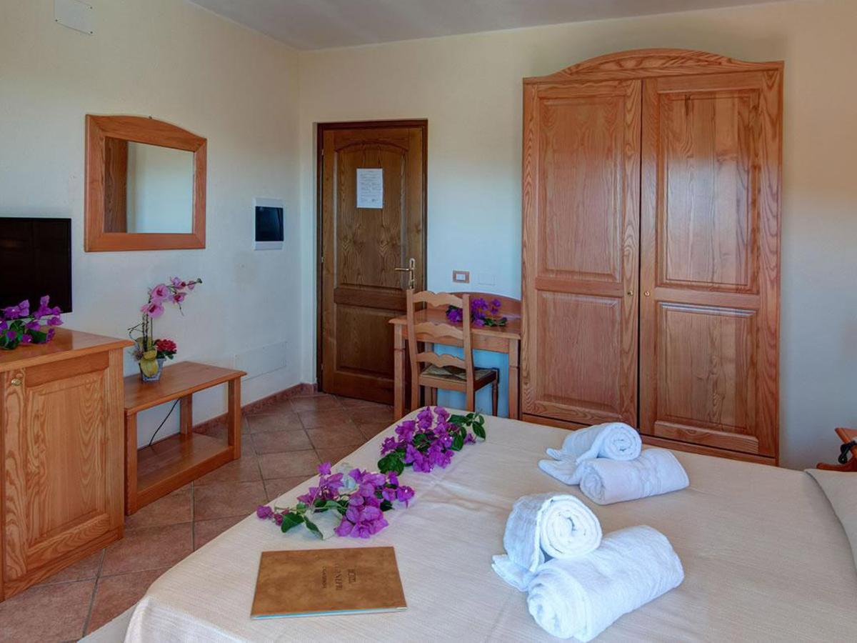 Suite met zithoek — Hotel i Ginepri