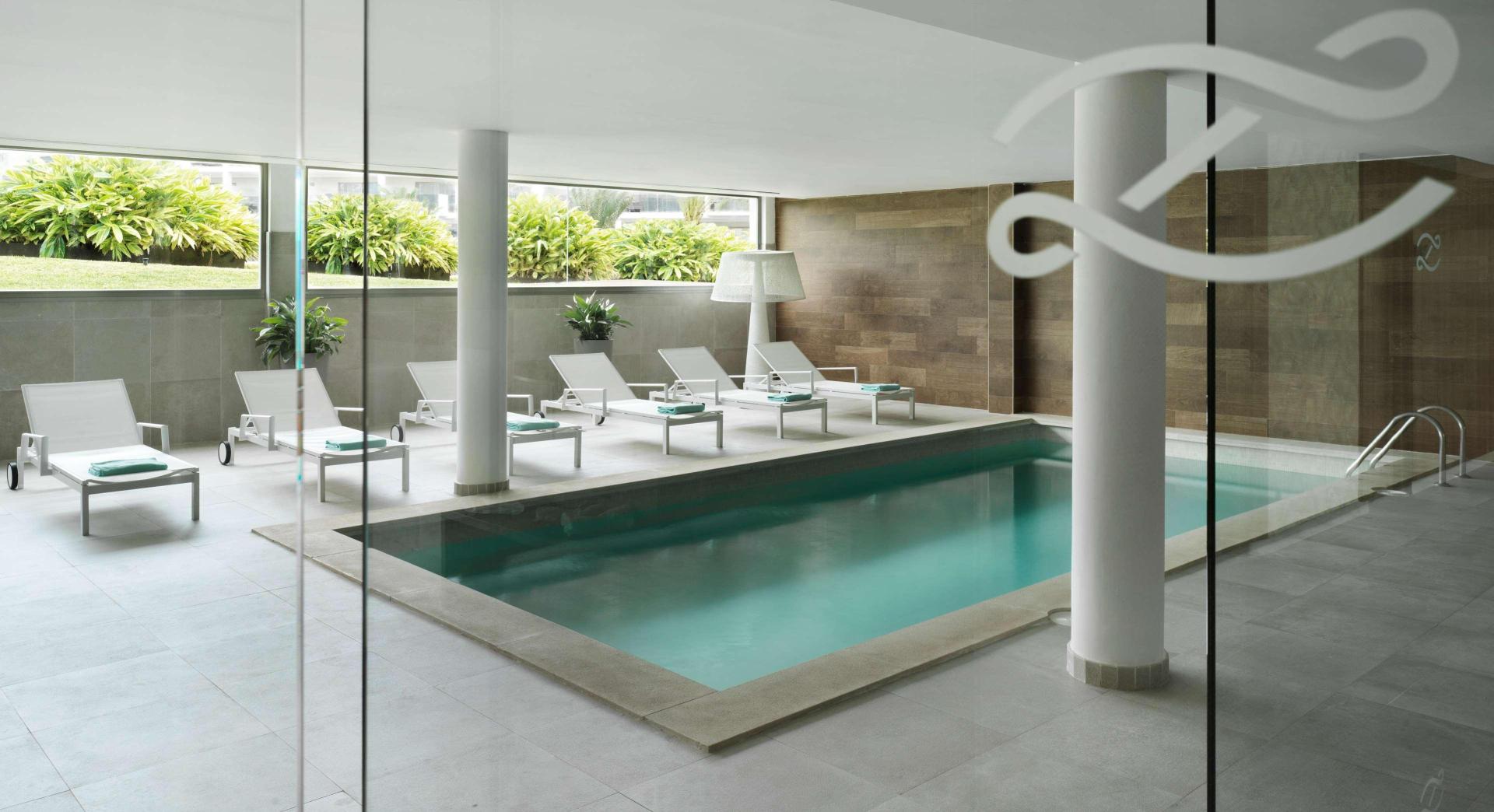 Relaxruimte met ligbedden — ZAFIRO Palace Palmanova