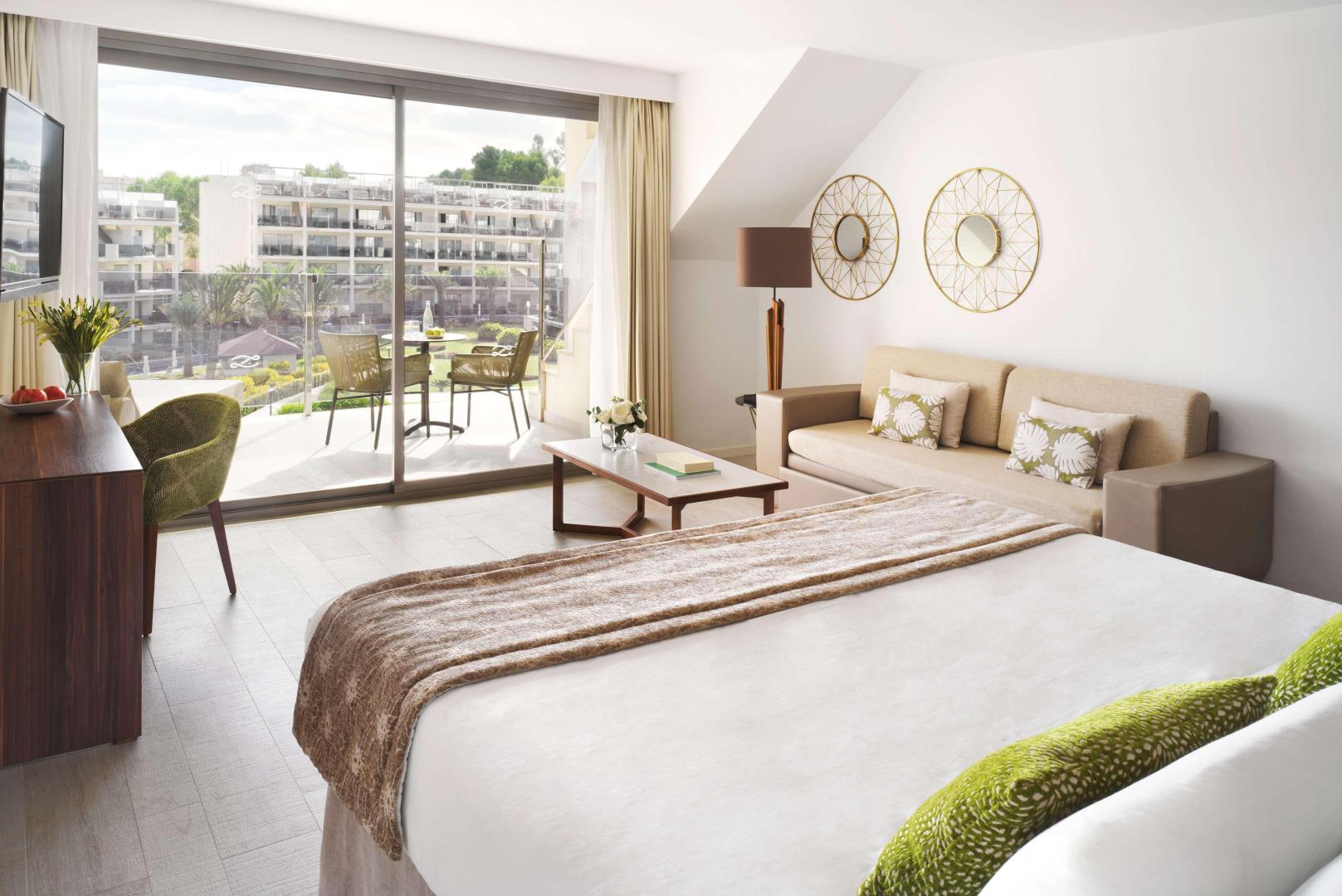 Suite met zithoek — ZAFIRO Palace Palmanova