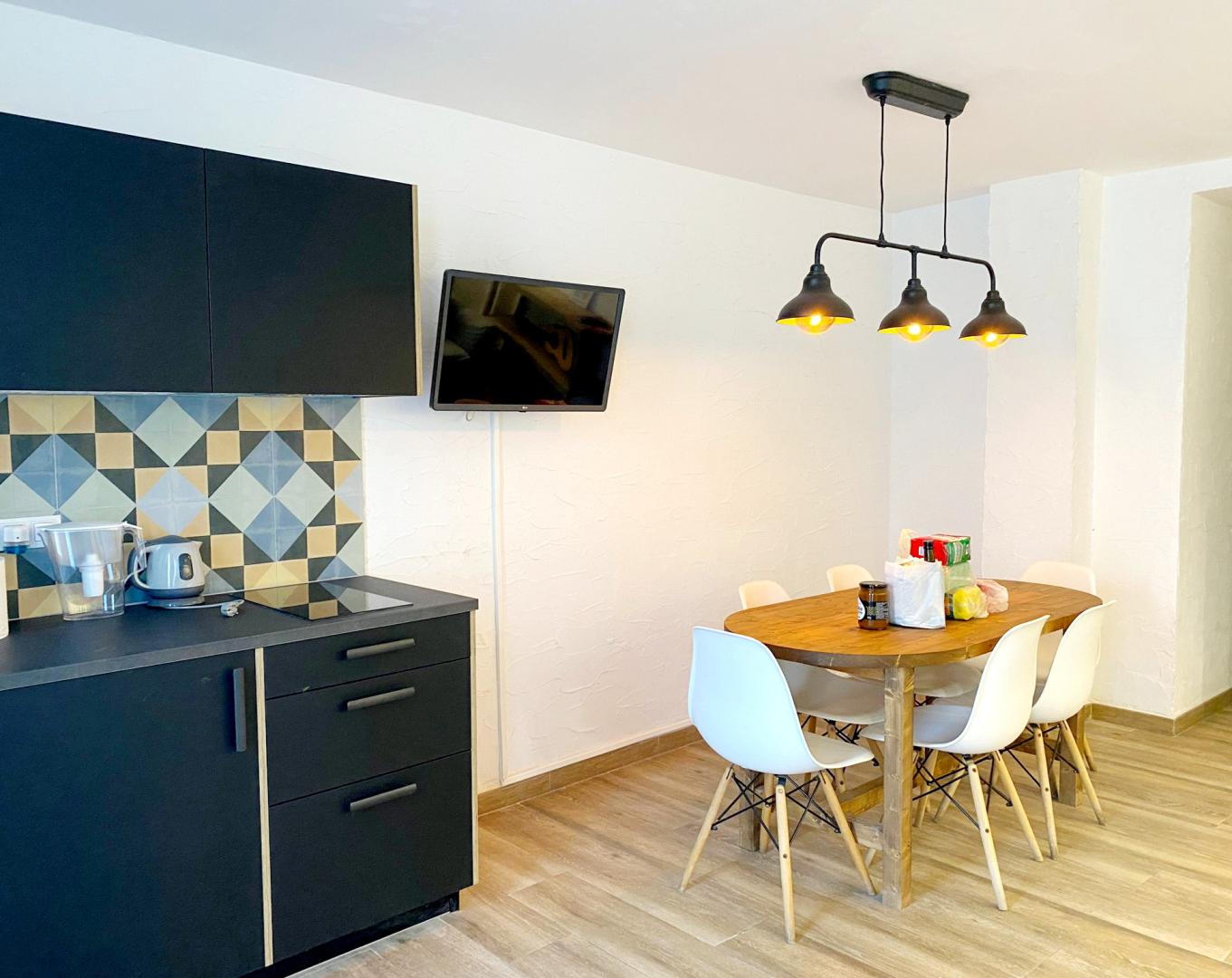 Suite met zithoek — Singular Hostel By Eurotels