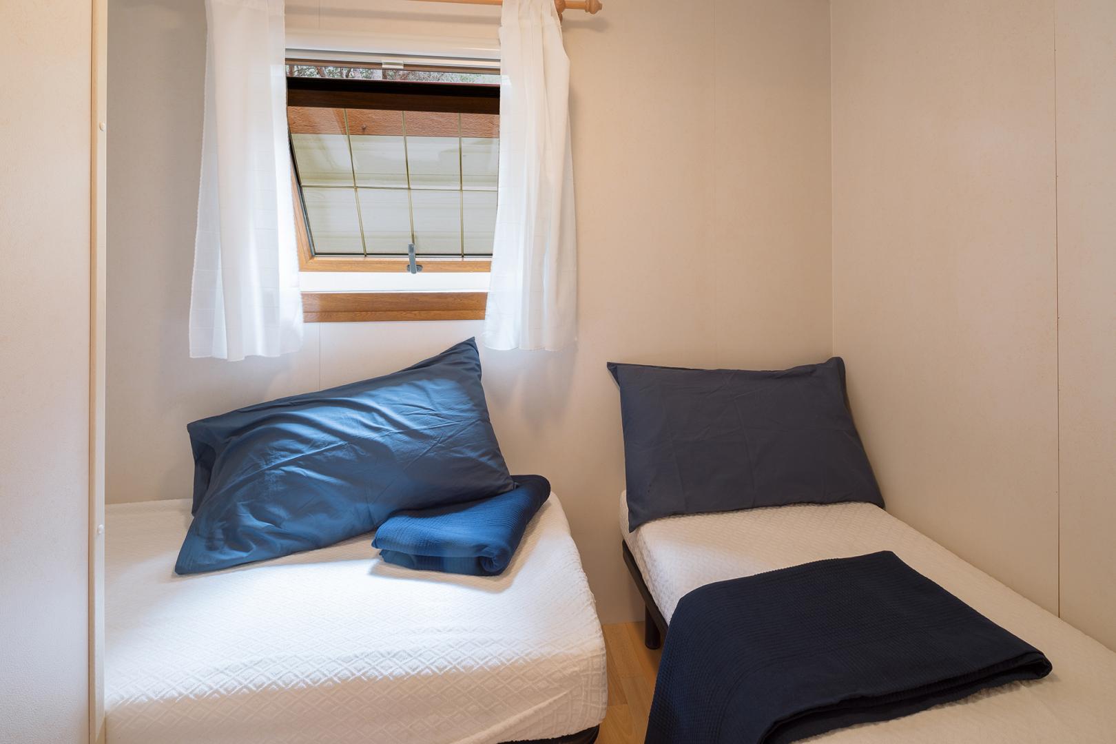 Suite met zithoek — Camping Village Baia Blu La Tortuga