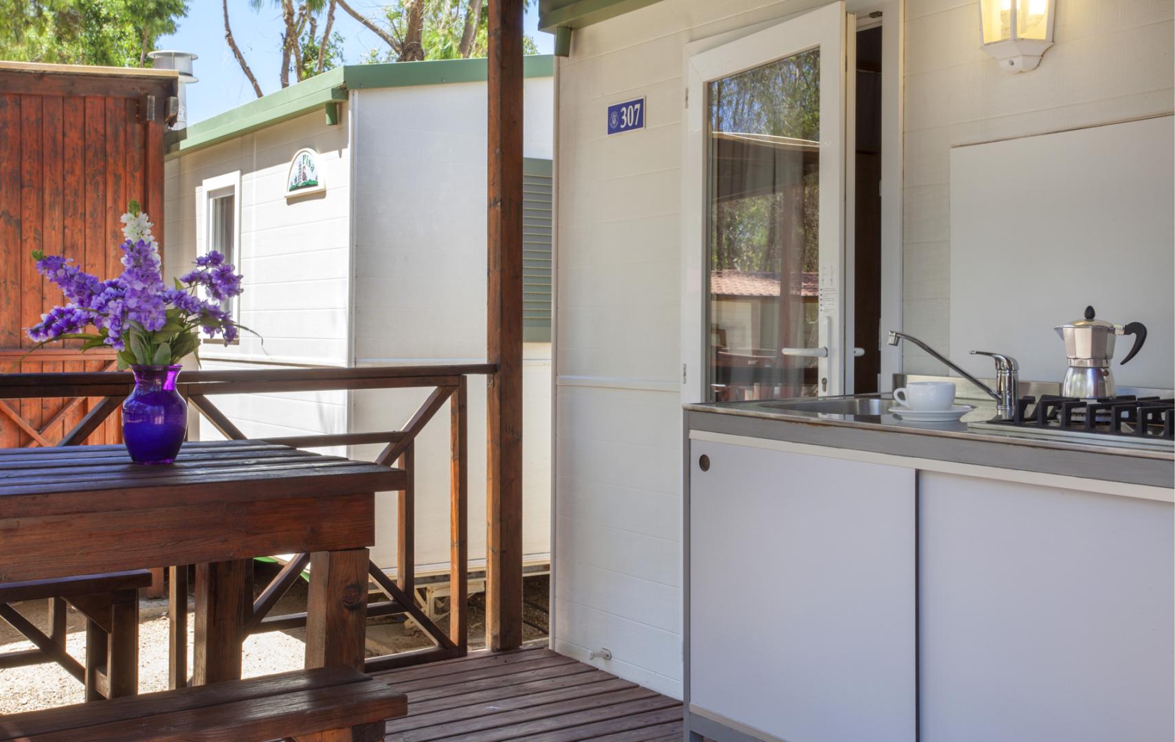 Badkamer met ligbad — Camping Village Capo D'Orso