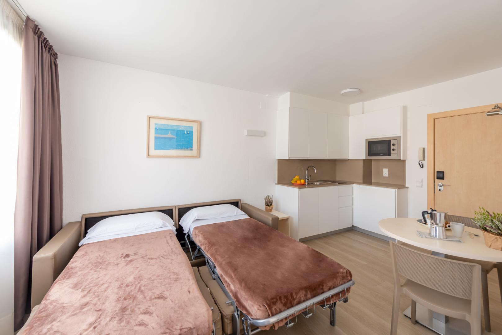 Kamer met twee aparte bedden — Atenea Park Appartements