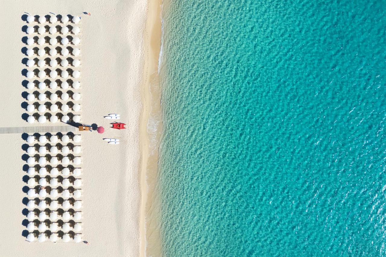 een bovenaanzicht van het strand en de oceaan bij Spiagge San Pietro, a charming & relaxing resort in Castiadas