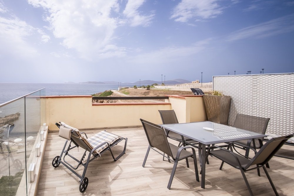 Zeezicht vanaf het balkon — Hotel Calabona