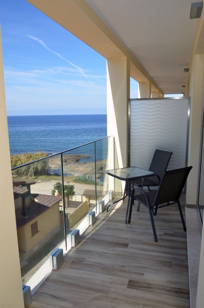 Zeezicht vanaf het balkon — Hotel Calabona