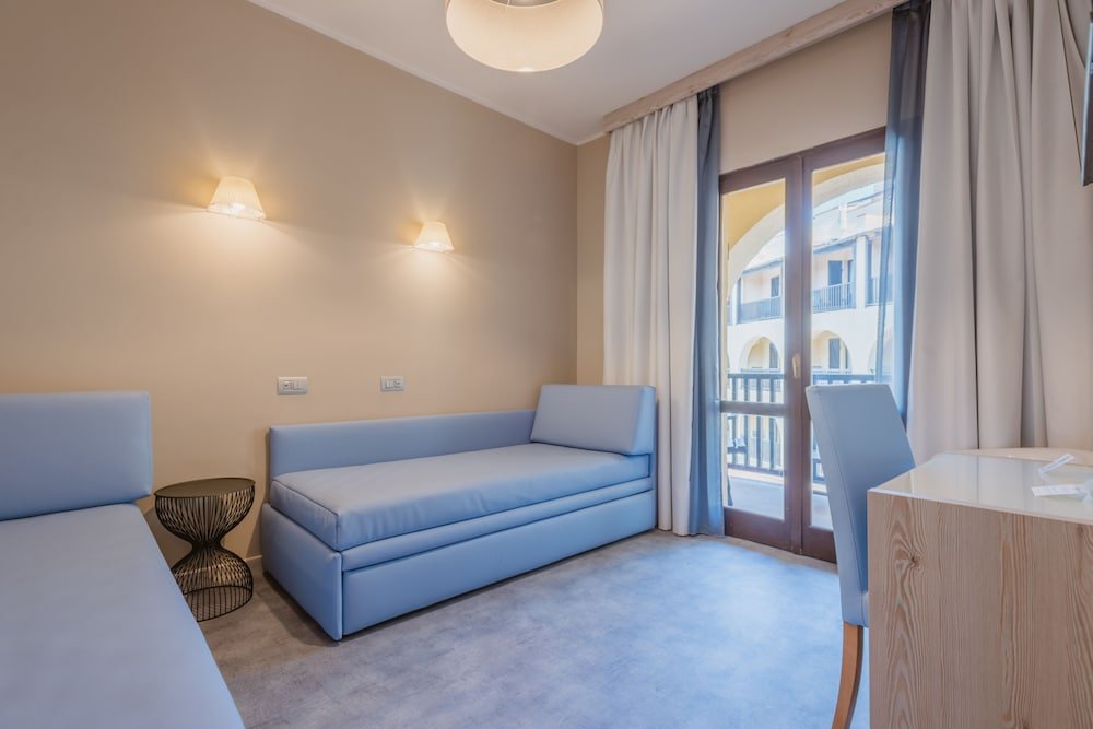 Suite met zithoek — Hotel Calabona
